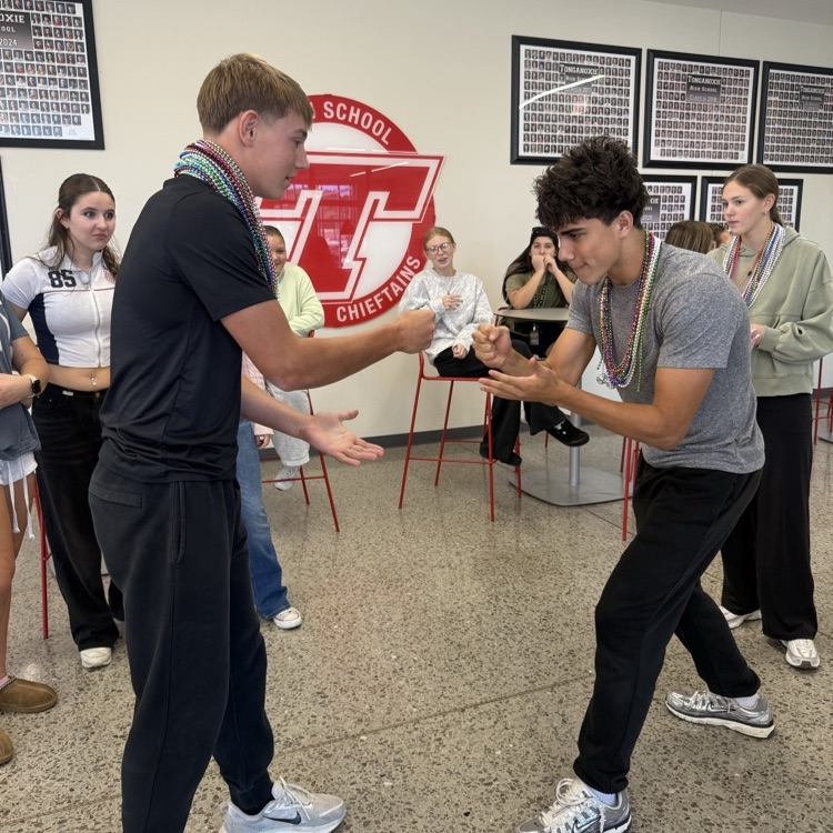 THS students playing rock paper scissors
