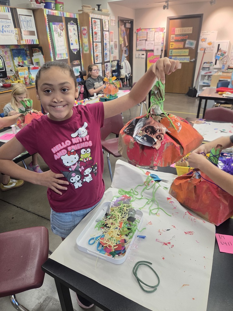 Student with her finished pumpkin