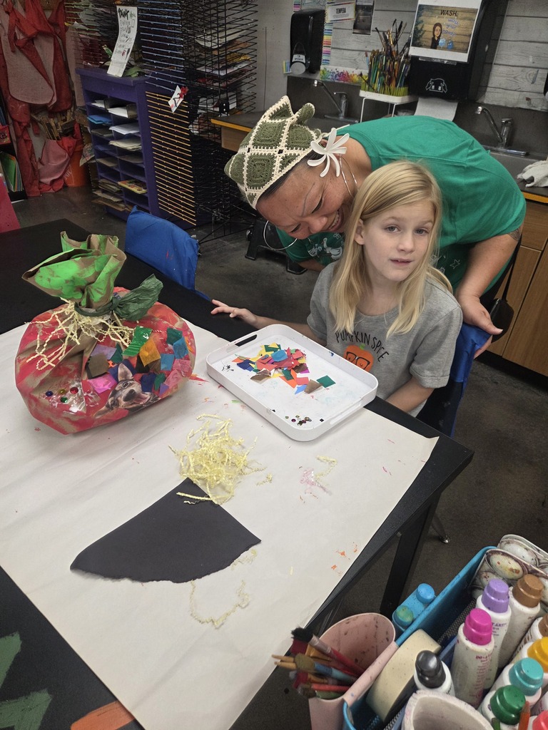 Student working on her  pumpkin