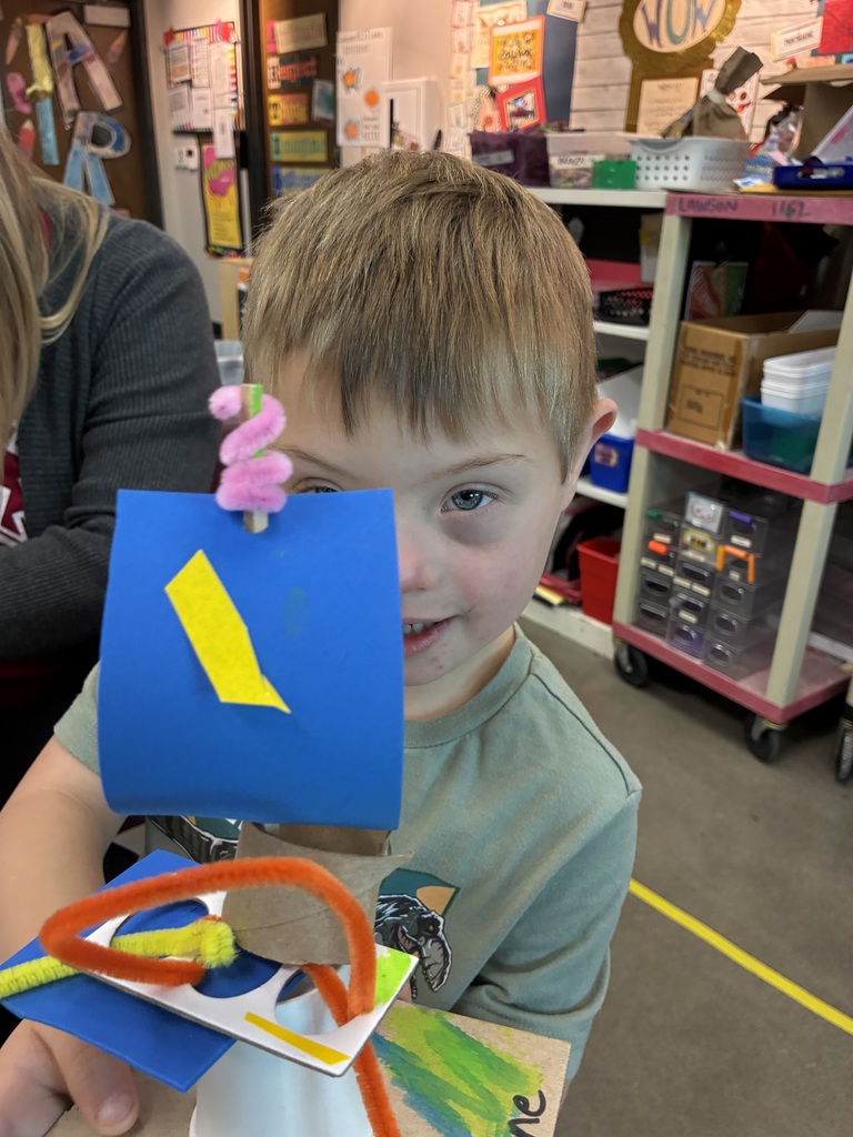 Student showing his sculpture 