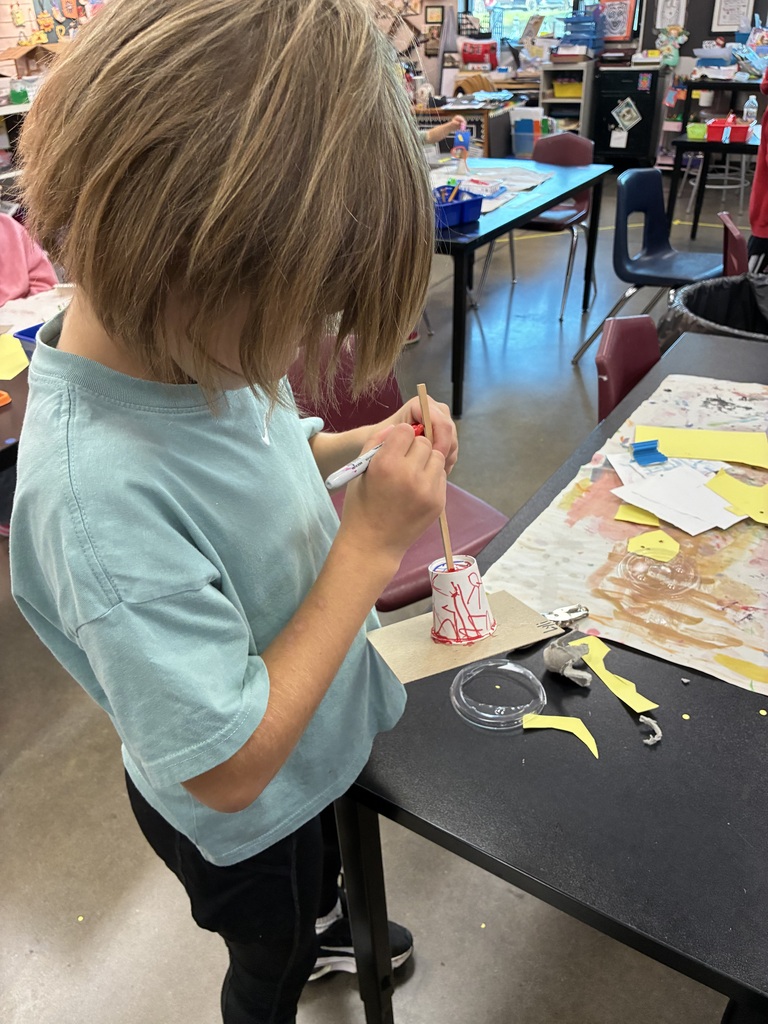 Student making a sculpture 