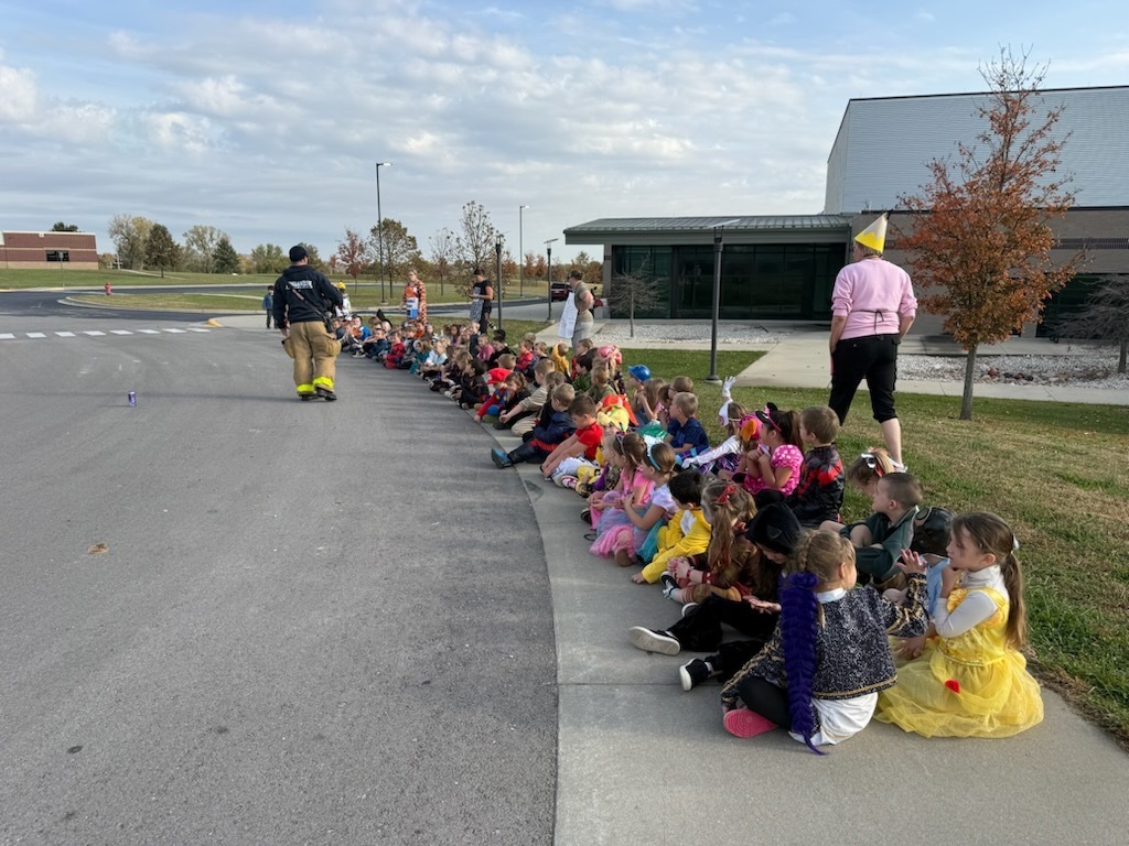 Kindergarten listening to the Tonganoxie Fire Department give a presentation.