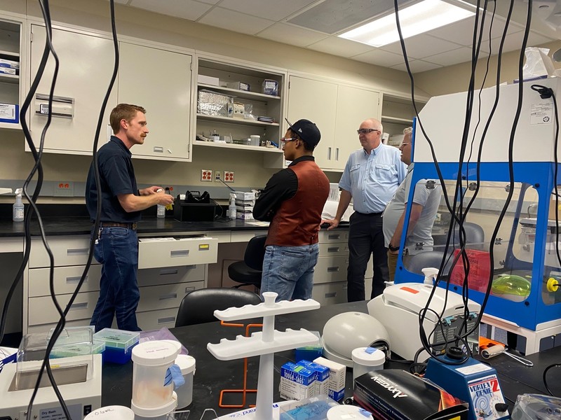 archer speaking to lab employees at the EPA