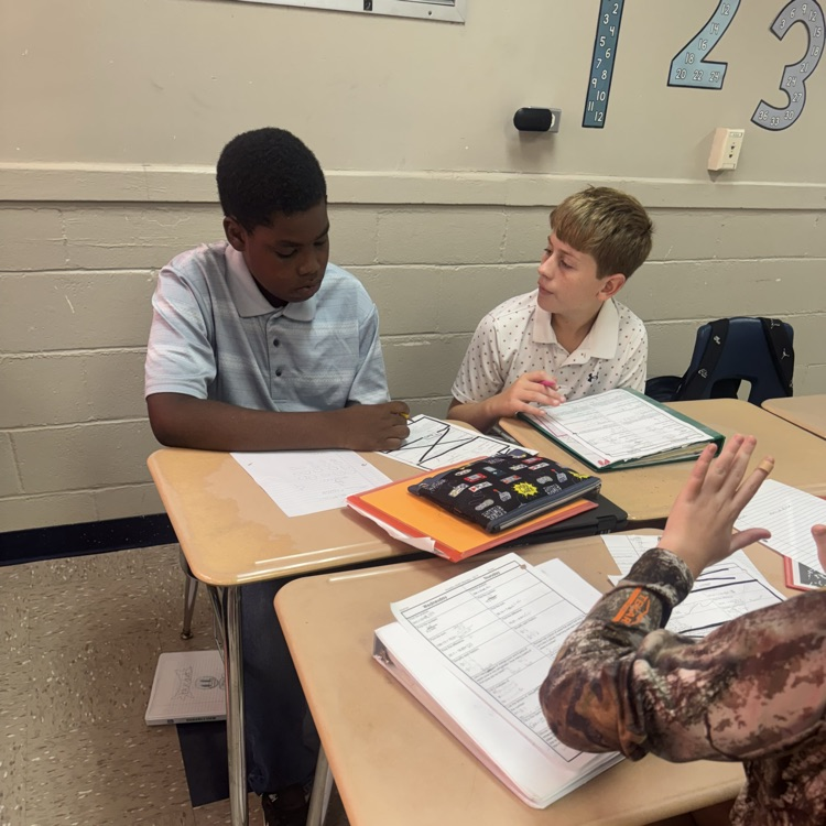 Mrs. Paulk, Mrs. Arnold, and Mrs. Mosley’s math classes are working with partners multiplying three-digit by two-digit numbers. #tces 