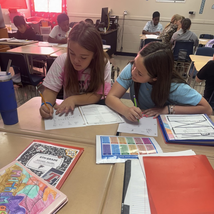 Mrs. Paulk, Mrs. Arnold, and Mrs. Mosley’s math classes are working with partners multiplying three-digit by two-digit numbers. #tces 