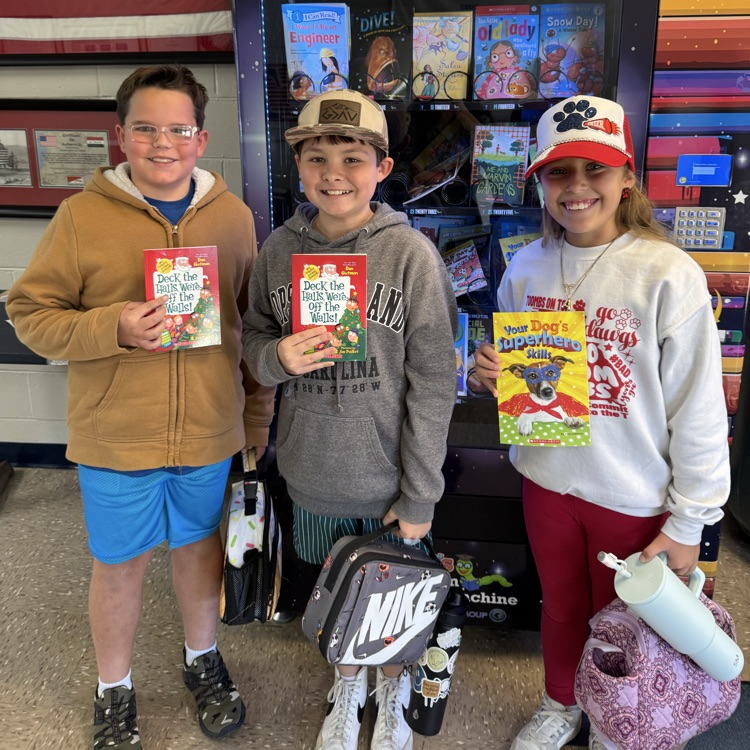 Jacob, Gunner, and Ashtyn earned a book coin for their hard work in Math iReady!