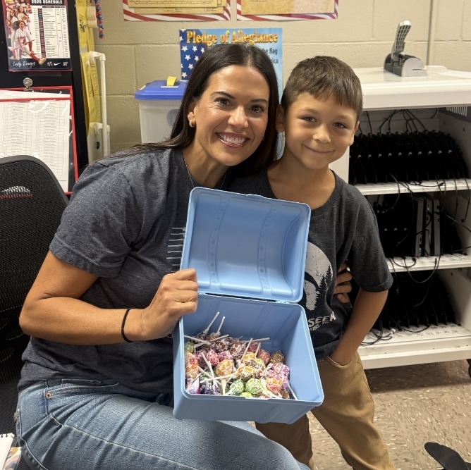 Seth helped Mrs. Haygood fill up her treasure box with suckers! Thank you, Seth