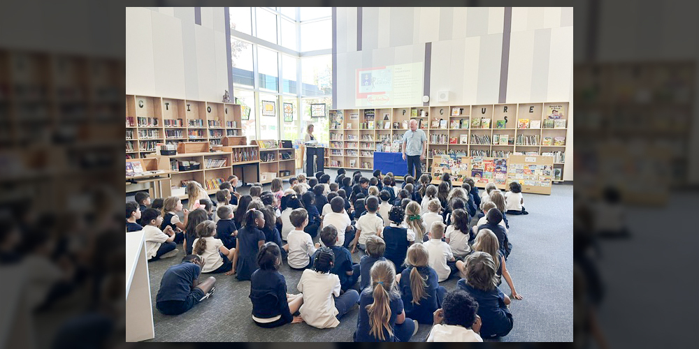 Photo of Holy Angels students listening to the presentation