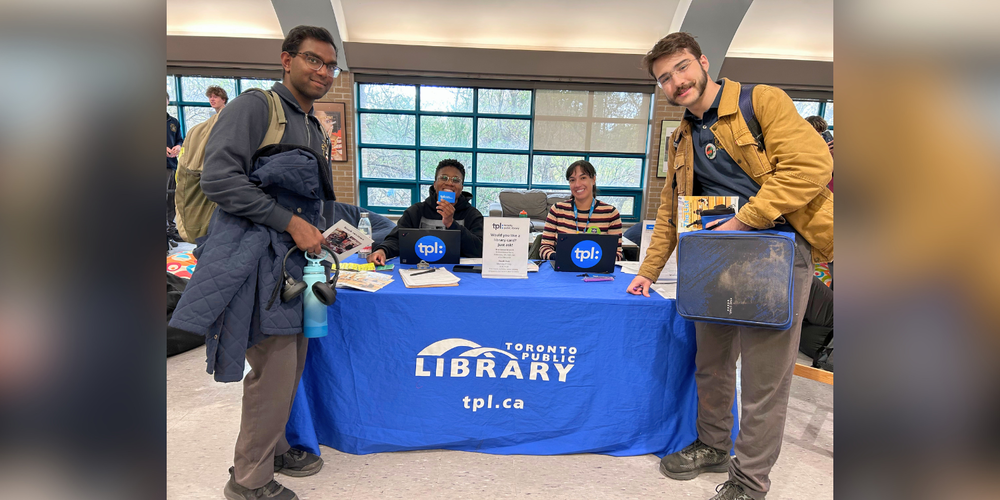 Students posing with the Toronto Public Library Reps