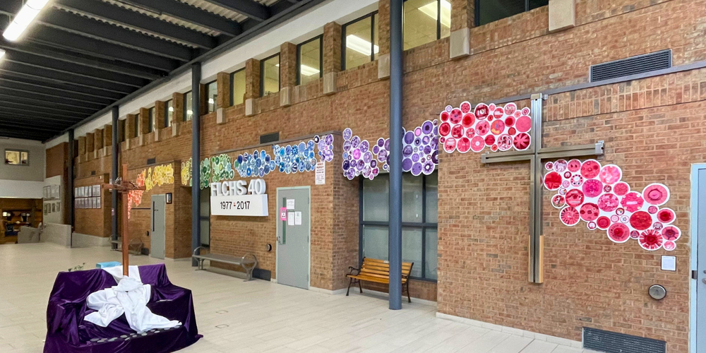 Artwork displayed in a hallway. 