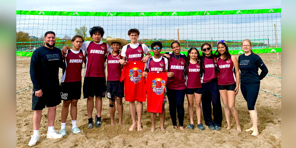 Students at the beach with Romero jerseys on