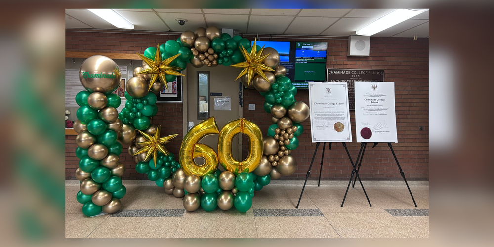 Balloon art with the number 60 in balloons in the center