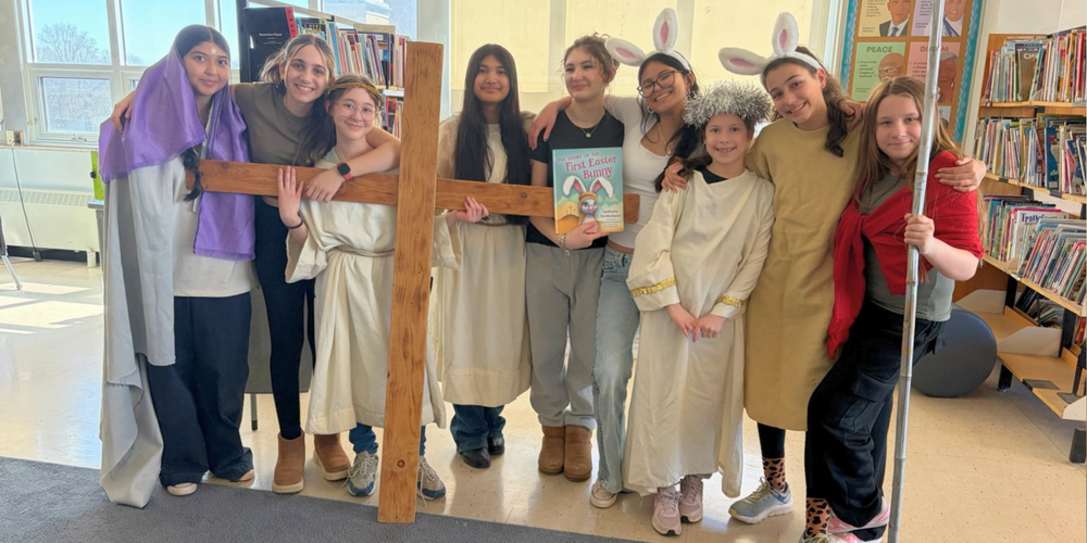 Group photo of young girls doing an Easter play
