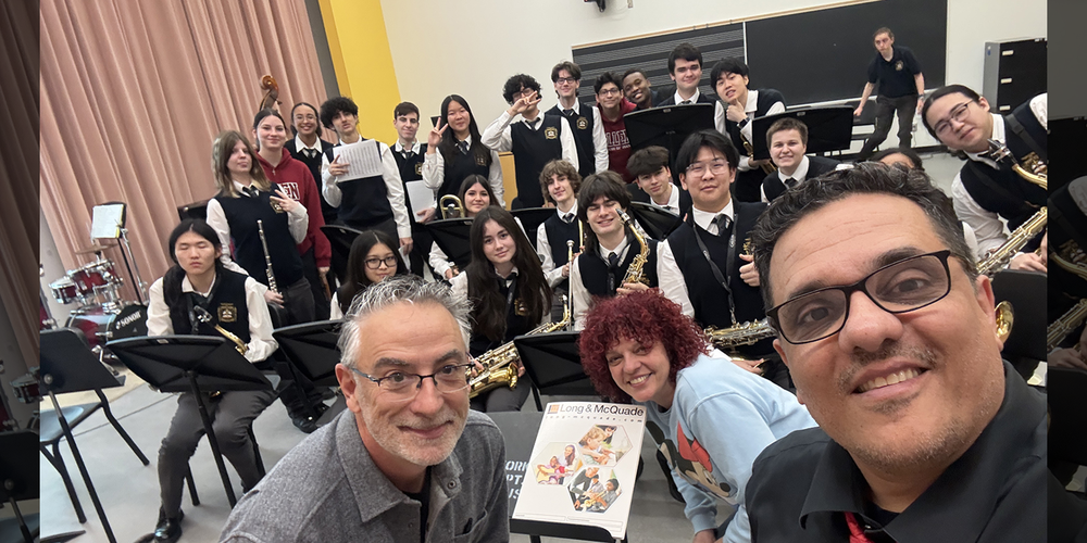 Group photo of Bishop Allen Academy band with their teachers