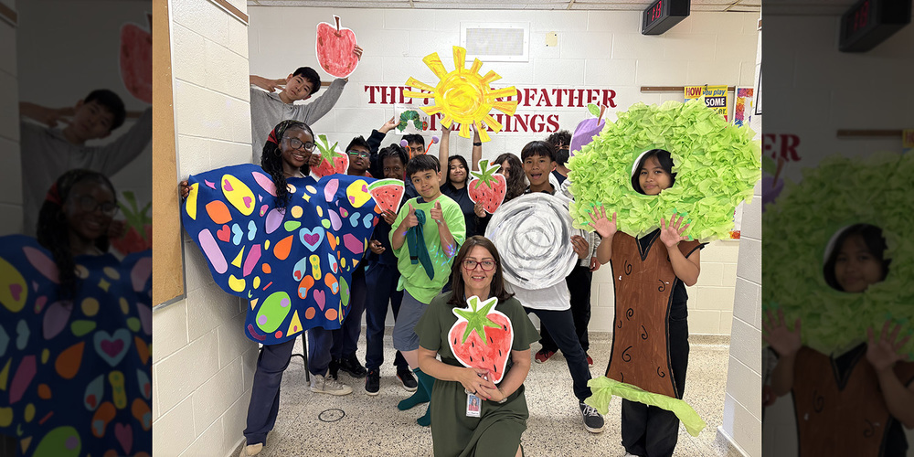 Photo of St. Aidan students and staff dressed up in costume for their adaptation
