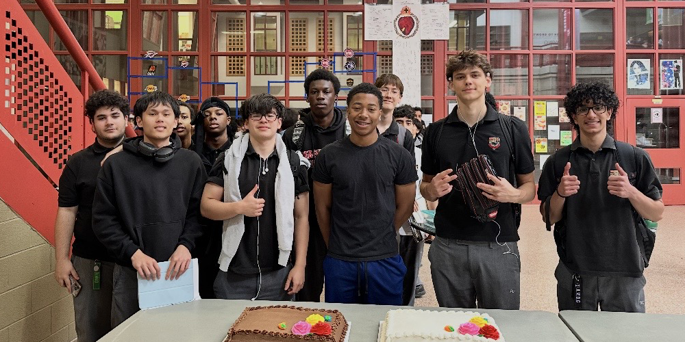 Photo of Brebeuf students together with their cakes