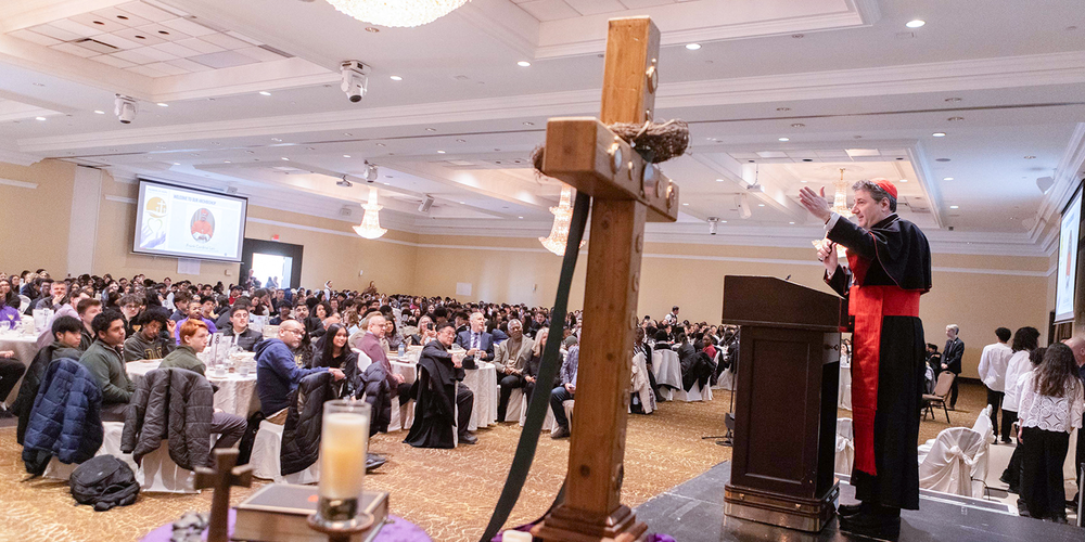 Photo of His Eminence Frank Cardinal Leo speaking to the attendees