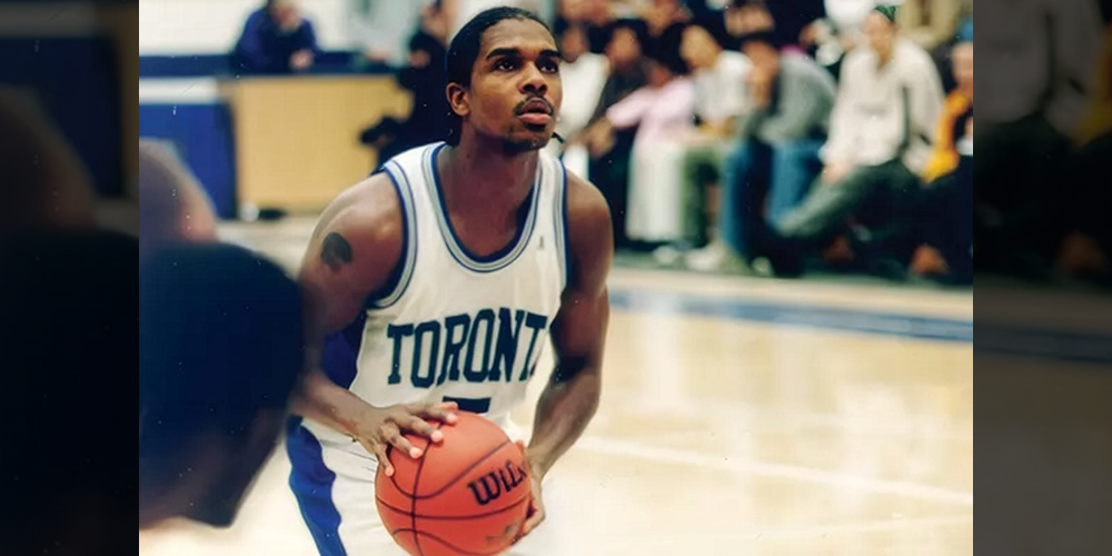 Photo of Sherwyn Benn on the court playing basketball