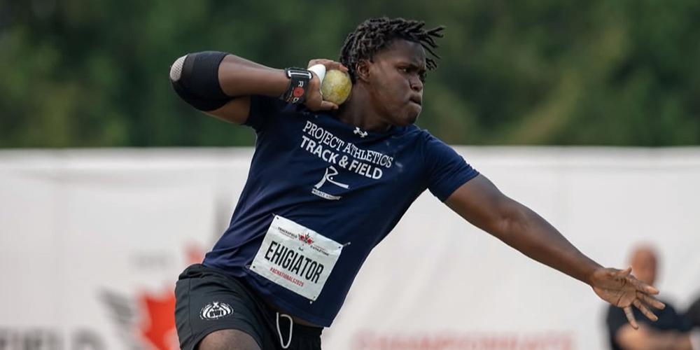 Photo of Eghosa on the field getting ready to throw