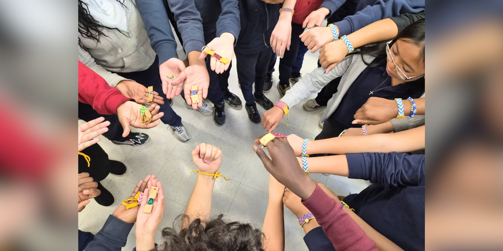 A group of hands in a circle
