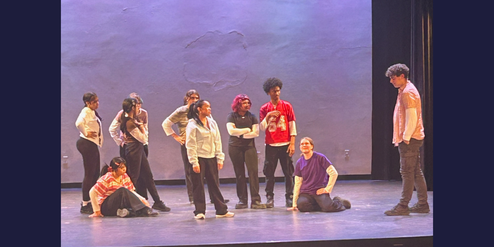 Students on a stage performing