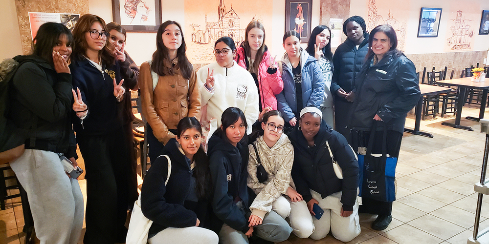 Group photo of Loretto College students at St. Francis Table