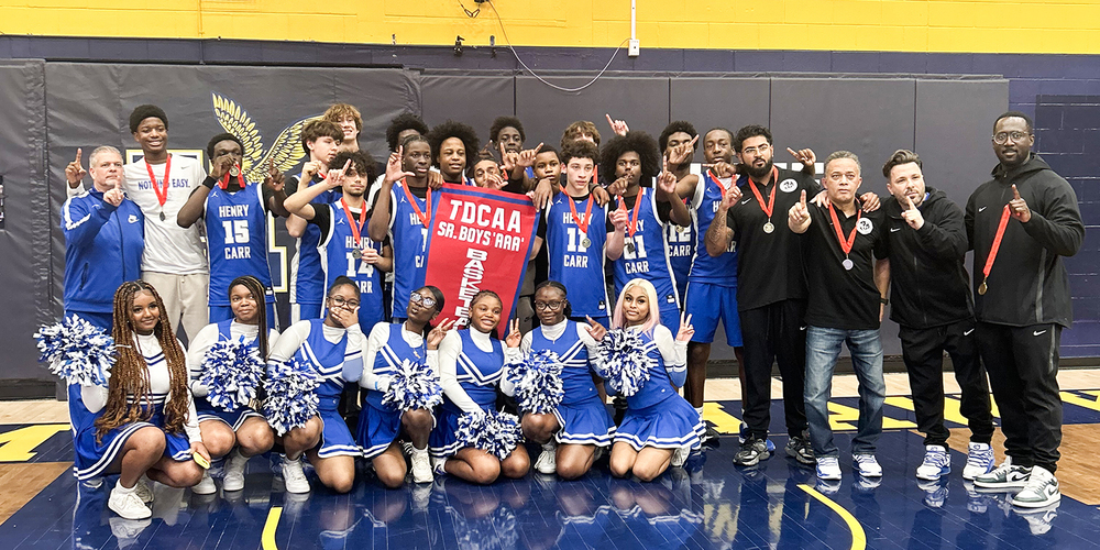 Group photo of FHC team players, cheerleaders, coaches and staff