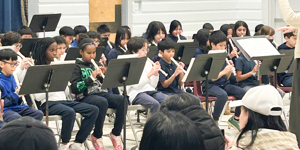 Photo of St. Thomas Aquinas students performing during Catholic Education Week
