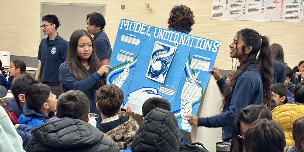 Elementary students attend presentation by high school students during Francis Libermann’s Take Our Kids to High School Day