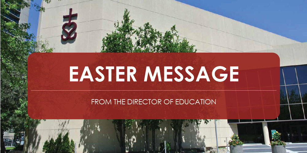 Exterior view of the Catholic Education Centre building with the Toronto Catholic District School Board logo mounted on the upper wall and trees in front of the entrance. A red banner across the centre displays the text ‘EASTER MESSAGE’ and ‘From the Director of Education'.
