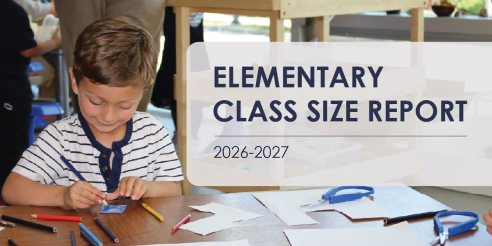 A child at a wooden table coloring with colored pencils while a sign behind them reads “ELEMENTARY CLASS SIZE REPORT.”