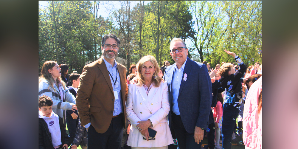 3 faculty posing outdoors
