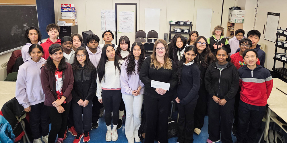 Group photo of St. Edmund Campion students and teacher