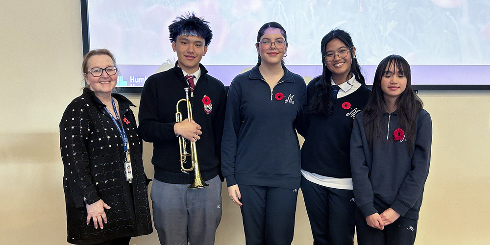 Group photo of the participating Madonna and Brebeuf students along with a TCDSB staff member