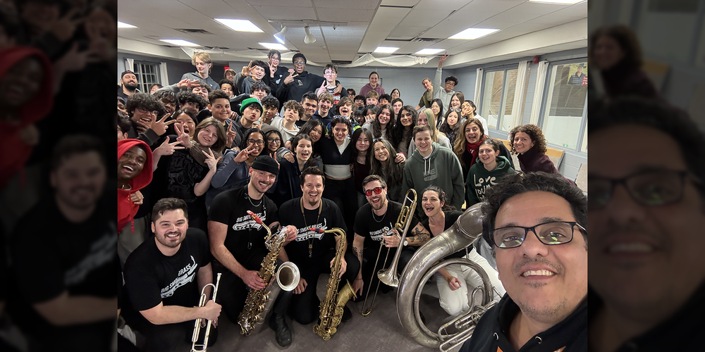 Photo of students and staff at the camp retreat
