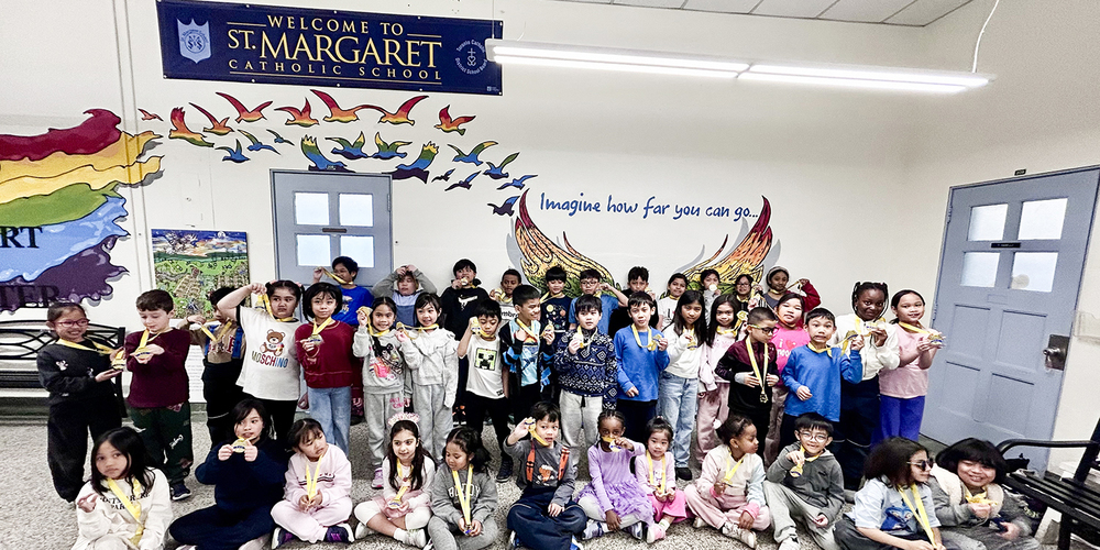 Group photo of St. Margaret students with their medals