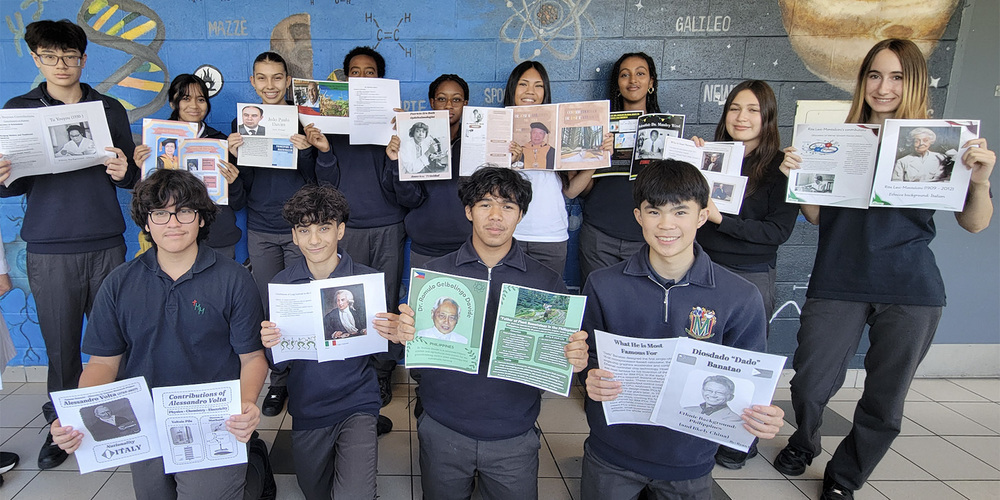 Group photo of Marshall McLuhan students with their projects