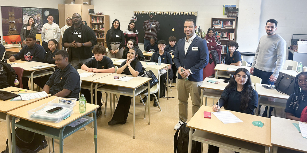 Photo of students and career coaches in the classroom during a session