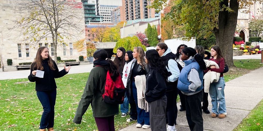 Group photo of students listening to a presenter