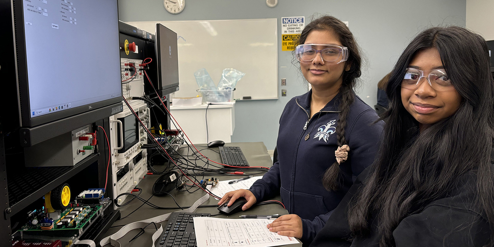 Photo of two SJOA students exploring Health and Wellness technology at Seneca