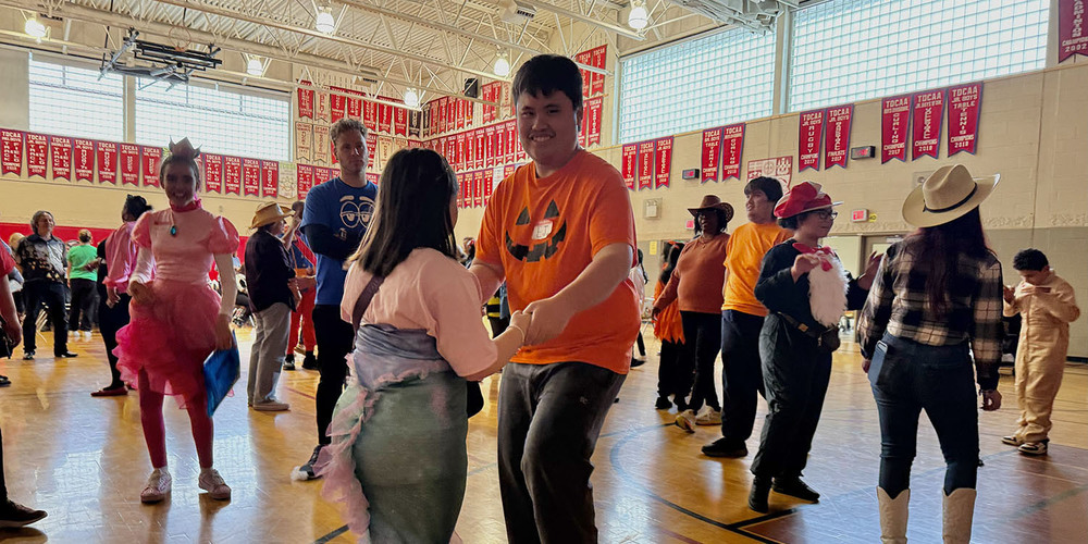 Photo of ISP students dancing at the Halloween Social
