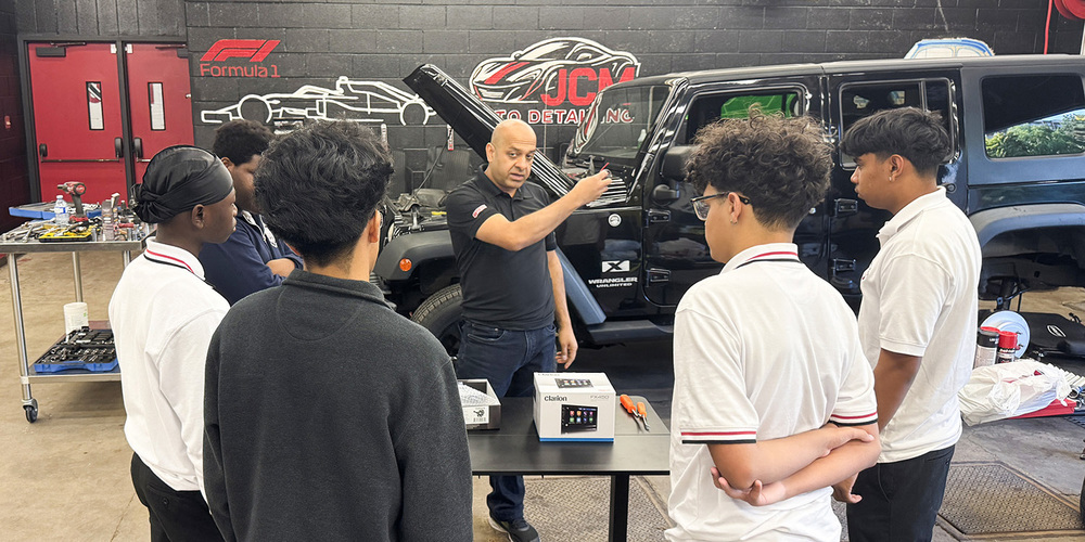 Photo of Sidd talking to students in the JCM transportation program