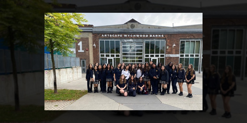 Group photo of Loretto College students at The Stop