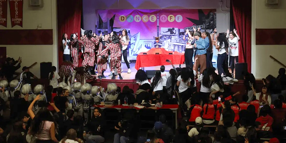 Photo of students performing on stage