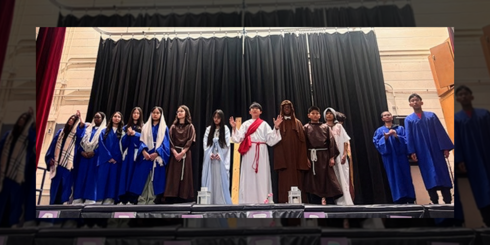 Photo of Blessed Trinity students performing the Stations of the Cross