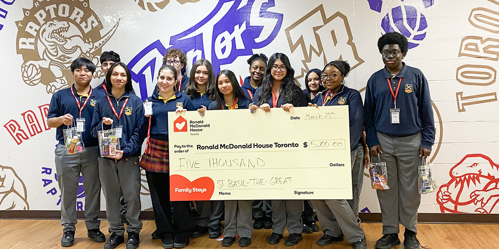 Group photo of St. Basil-the-Great students with their grant cheque
