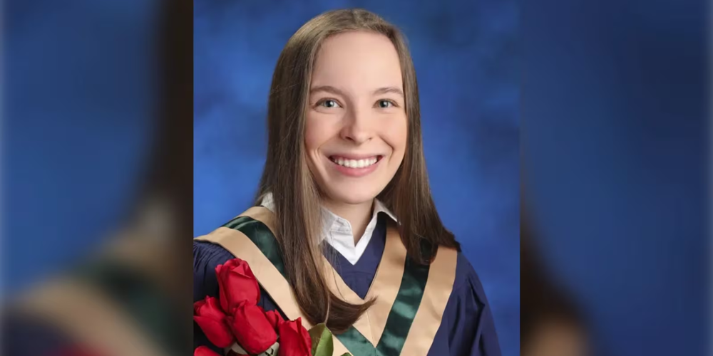 Photo of Sophie in her graduation robes