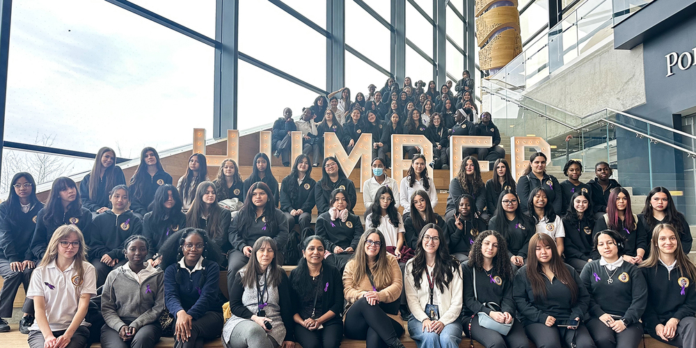 Group photo of students attending the event