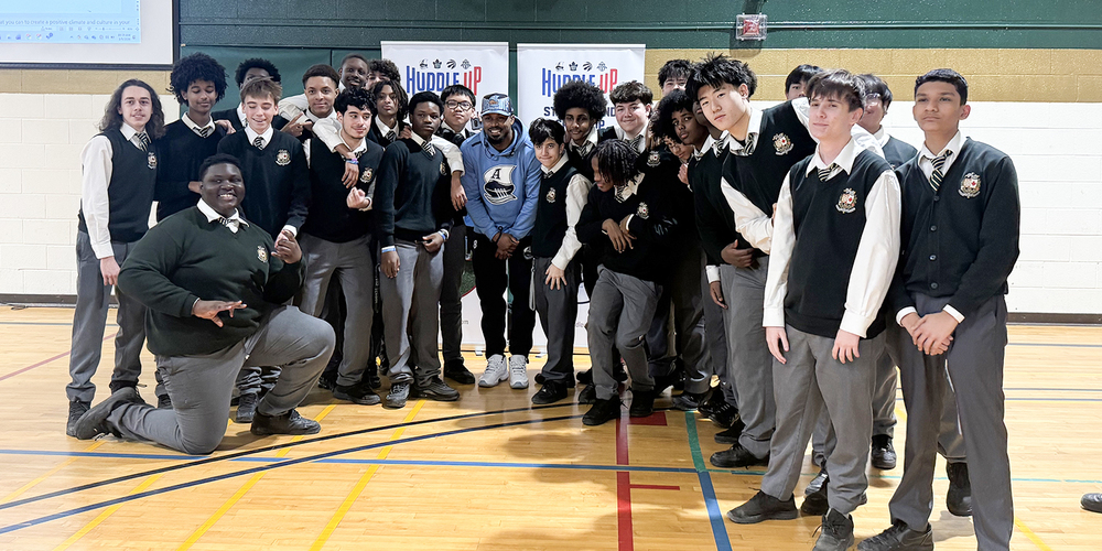 Group photo of Chaminade students at the assembly