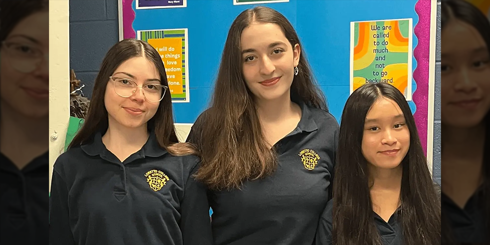 Photo of three Loretto College students in their school uniform